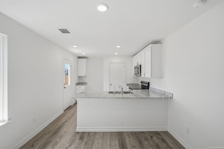 Furnished interior view inside a new home in Vista Real, Converse (Image 28).