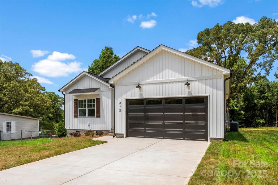 Front exterior of a new home in , Gastonia, NC, highlighting curb appeal (Image 2). Front exterior of a new home in , Gastonia, NC, highlighting curb appeal (Image 2).