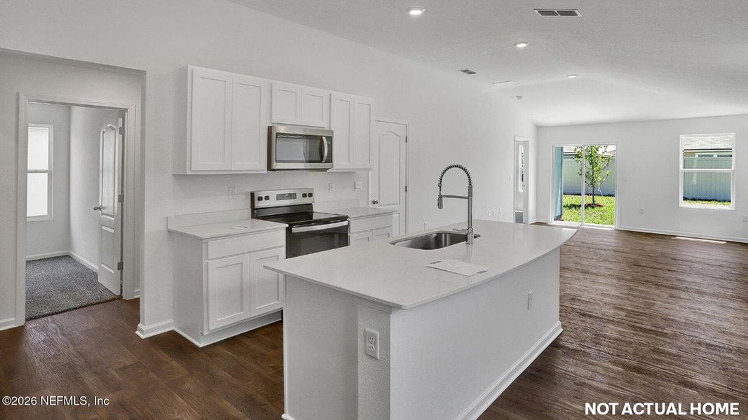 Furnished interior view inside a new home in Grand Reserve, Bunnell (Image 12).