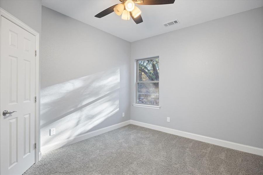 Secondary spare room with ceiling fan