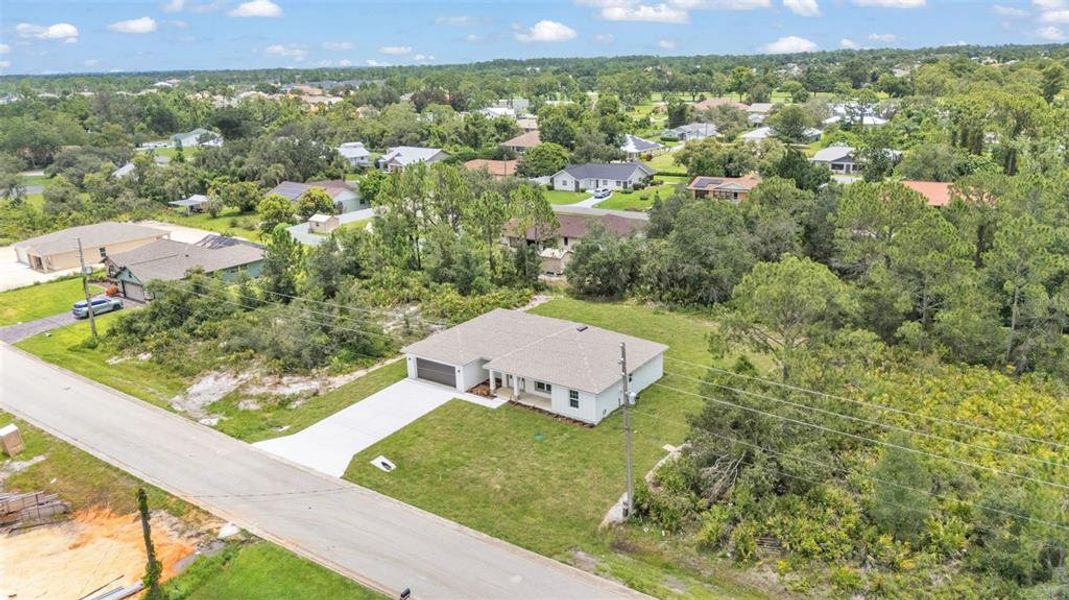 Front exterior of a new home in , Sebring, FL, highlighting curb appeal (Image 32).