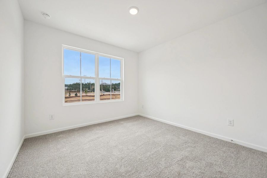 Bed 2 - Neutral tones and clean lines with modern comfort.