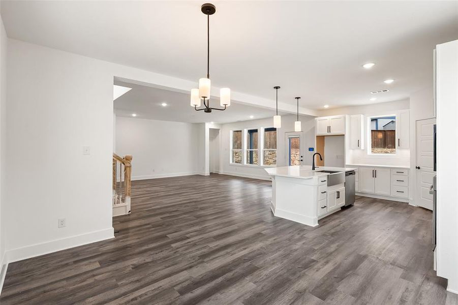 View from dining area of the kitchen and living area