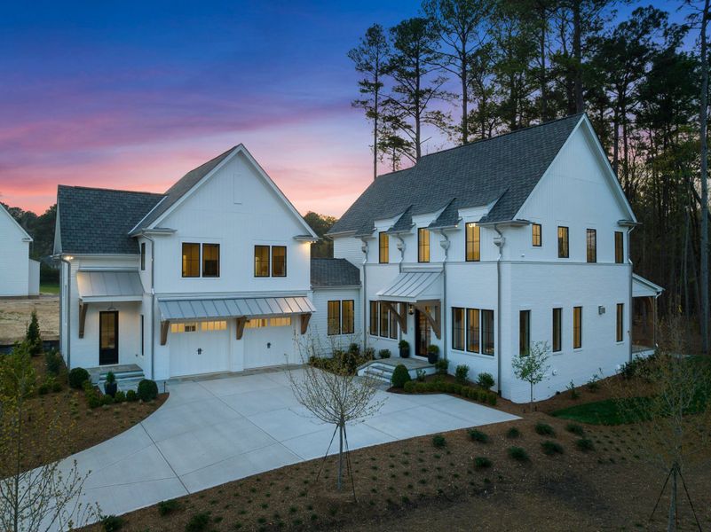 Representative exterior photo of a completed home built from the Eloise by Homes by Dickerson in The Founding at Blue Ridge, Raleigh, NC (Image 25). Representative exterior photo of a completed home built from the Eloise by Homes by Dickerson in The Founding at Blue Ridge, Raleigh, NC (Image 25).