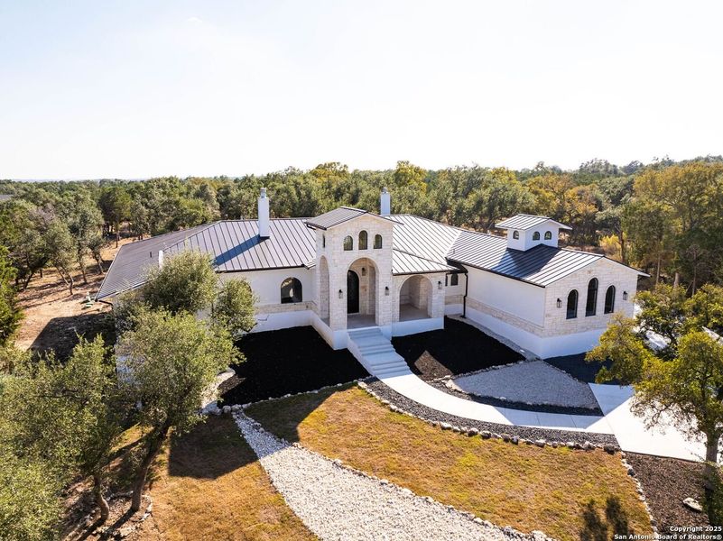 Front exterior of a new home in , New Braunfels, TX, highlighting curb appeal (Image 32).