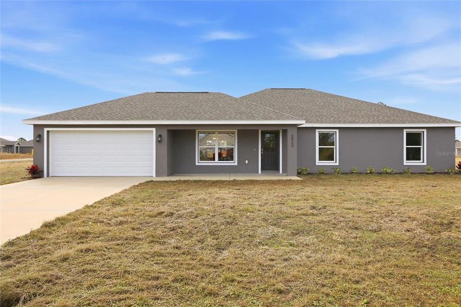 Exterior details and patio area of a home in , Sebring (Image 3).