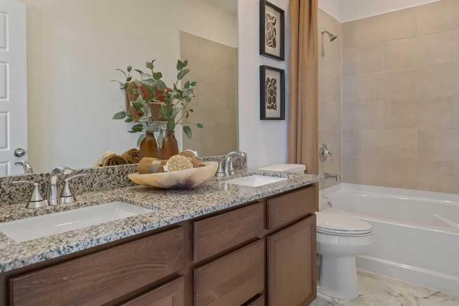Dual-sink vanity at primary bath