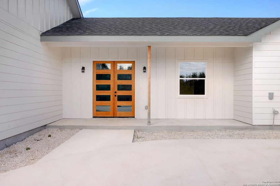 Exterior details and patio area of a home in , Fischer (Image 1).