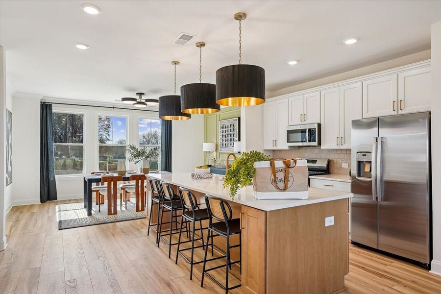 Representative furnished interior of a home built from the Pamlico by Caruso Homes in Midtown Rows, Fuquay Varina (Image 9). Representative furnished interior of a home built from the Pamlico by Caruso Homes in Midtown Rows, Fuquay Varina (Image 9).
