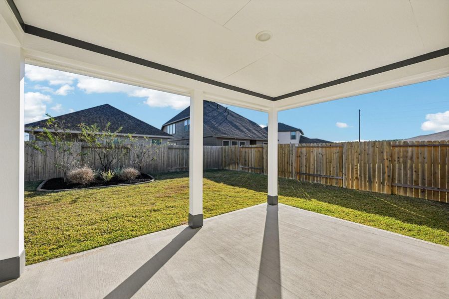 Exterior details and patio area of a home in The Landing, New Caney (Image 20).