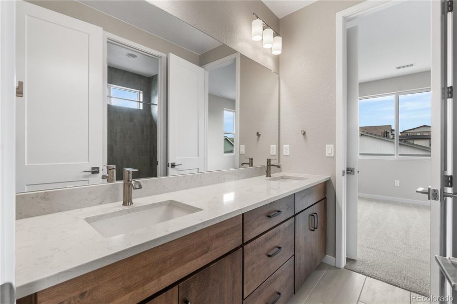 Furnished interior view inside a new home in Tribute at Lyric, Lone Tree (Image 16).