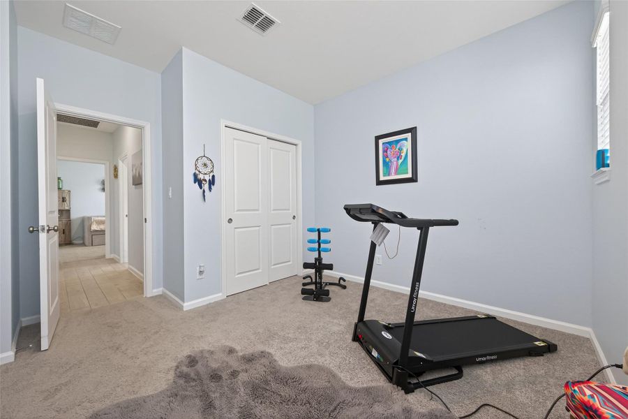 Versatile room featuring a closet and functional layout