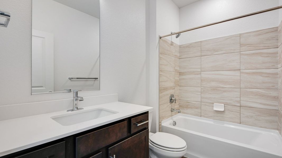 Representative furnished interior of a home built from the Harmony by D.R. Horton in Sky Ranch, Watkins (Image 11).