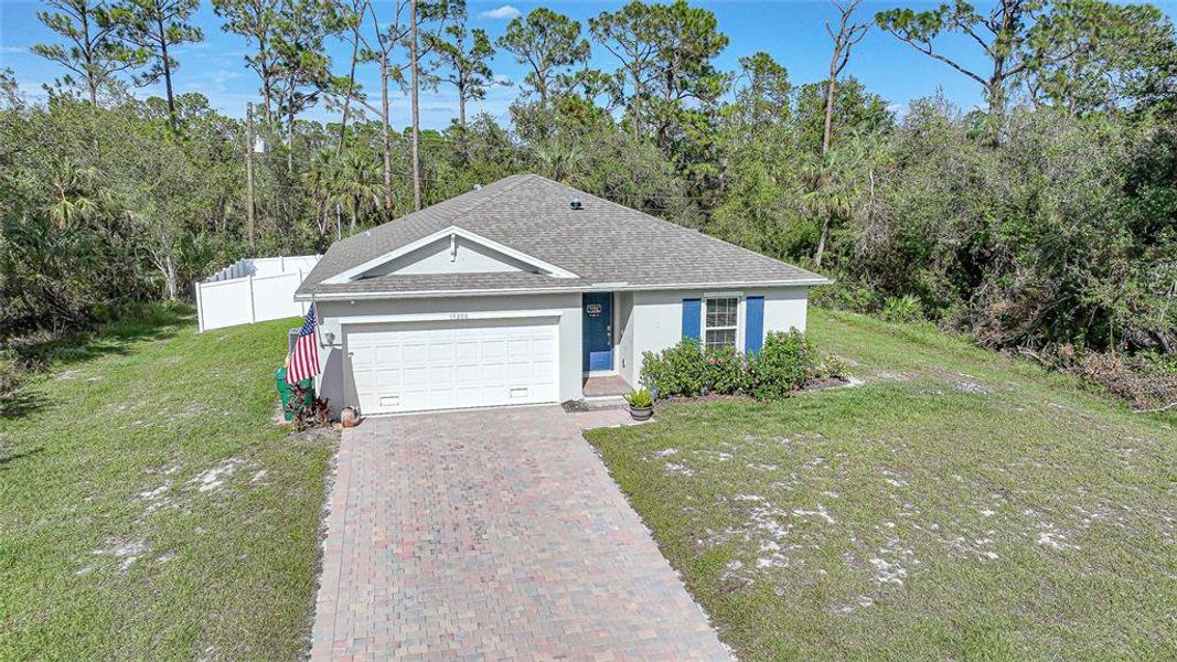 Front exterior of a new home in , Port Charlotte, FL, highlighting curb appeal (Image 25). Front exterior of a new home in , Port Charlotte, FL, highlighting curb appeal (Image 25).