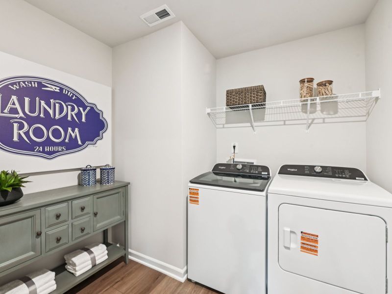 Laundry room in the Taylorsville floorplan at a Meritage Homes community in Mebane, NC. Laundry room in the Taylorsville floorplan at a Meritage Homes community in Mebane, NC.