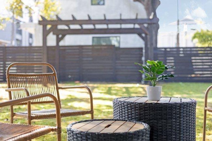 Whether you're sitting under the covered or playing in this yard, there's room for a pool, cold plunge, yoga, bocce ball, dogs, tossing a ball ... it's all up to you!