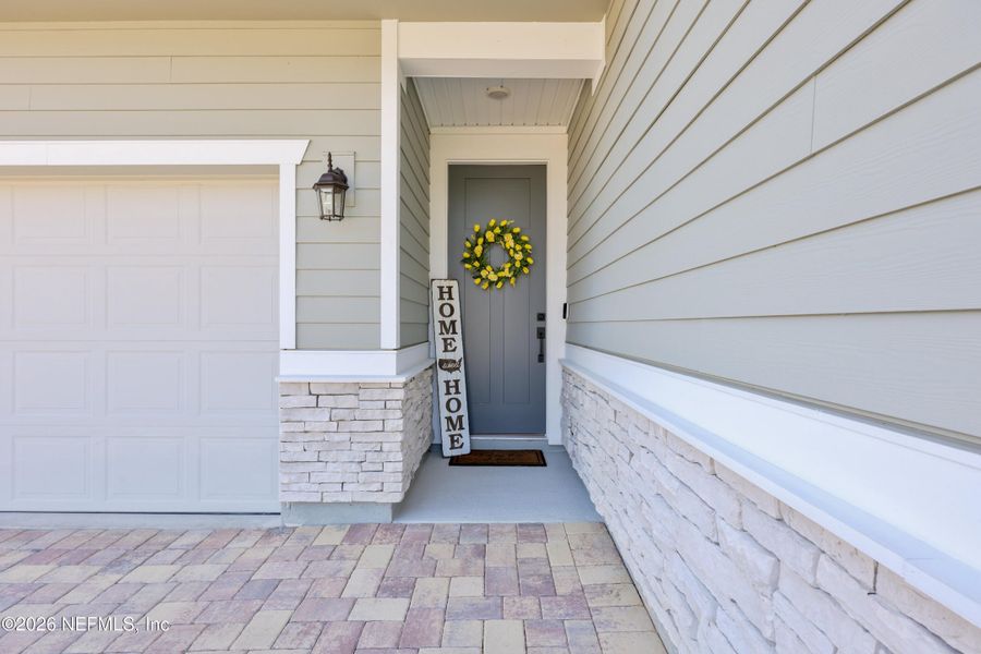Exterior details and patio area of a home in Elm Creek at Silverleaf, St. Augustine (Image 31). Exterior details and patio area of a home in Elm Creek at Silverleaf, St. Augustine (Image 31).