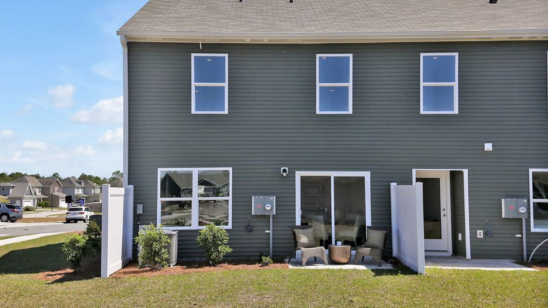Representative exterior photo of a completed home built from the MITCHELL TOWNHOME by D.R. Horton in Grayson Park Townhomes, Leland, NC (Image 20). Representative exterior photo of a completed home built from the MITCHELL TOWNHOME by D.R. Horton in Grayson Park Townhomes, Leland, NC (Image 20).