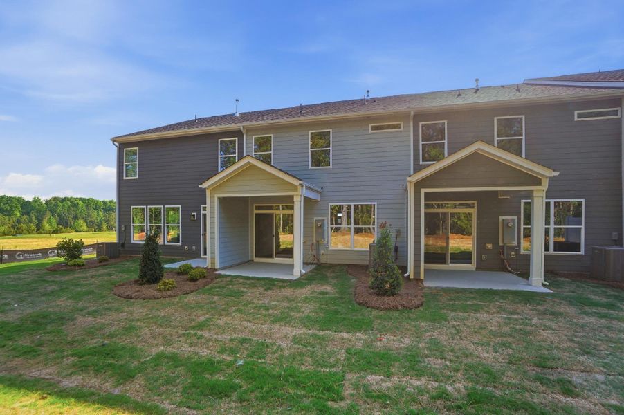 Exterior details and patio area of a home in Blythe Mill Townhomes, Waxhaw (Image 19).
