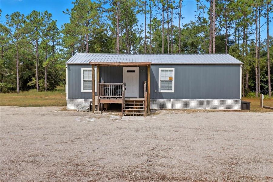 Front exterior of a new home in , Dunnellon, FL, highlighting curb appeal (Image 18). Front exterior of a new home in , Dunnellon, FL, highlighting curb appeal (Image 18).