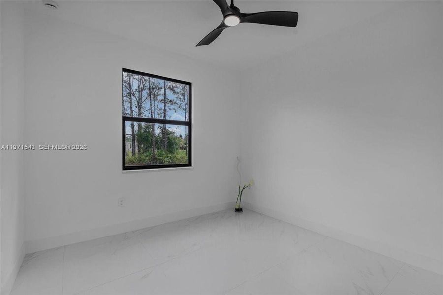 Spacious, unfurnished interior of a new home in , Lehigh Acres (Image 48).