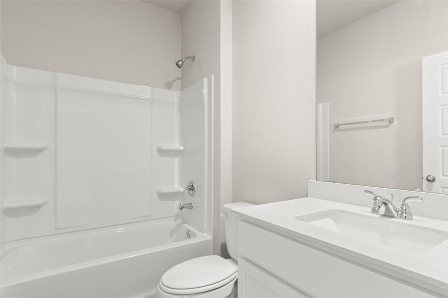 Bathroom with bathing tub / shower combination and vanity