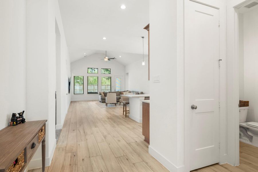 Continuing through the home and down the entryway leads you to a splendid open concept layout, and you find a coat closet and half bath tucked away off the main living area! Continuing through the home and down the entryway leads you to a splendid open concept layout, and you find a coat closet and half bath tucked away off the main living area!