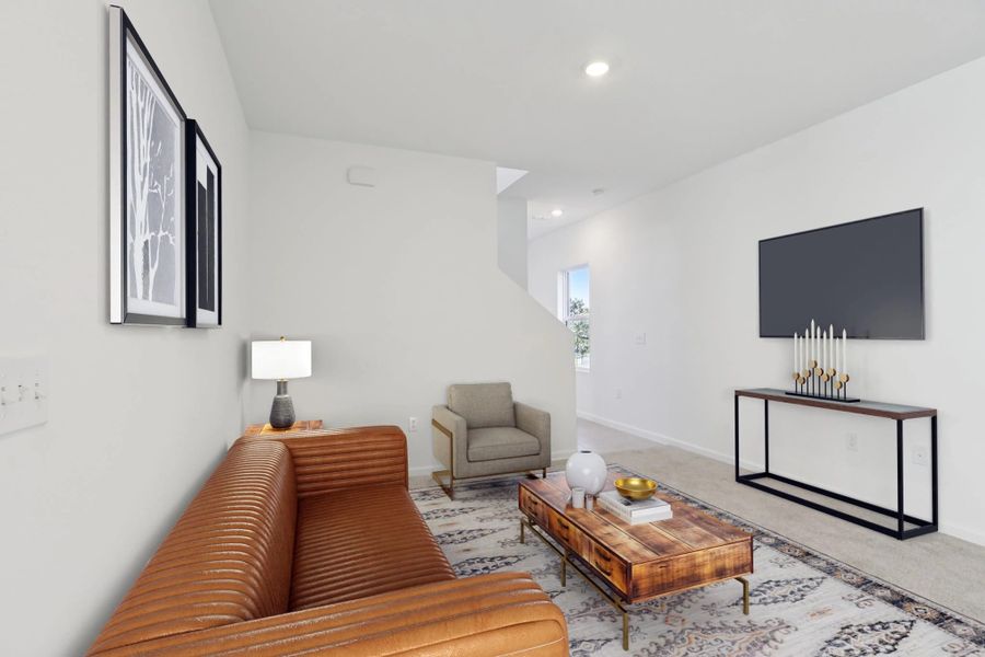 Representative furnished interior of a home built from the Keele by Starlight Homes in Hawks Run, Kissimmee (Image 7).