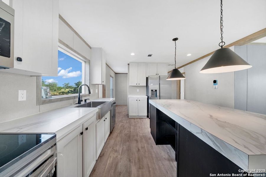 Furnished interior view inside a new home in , Moore (Image 11).