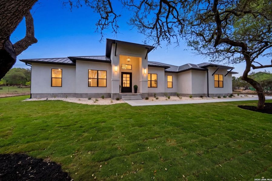 Exterior details and patio area of a home in , Boerne (Image 32).