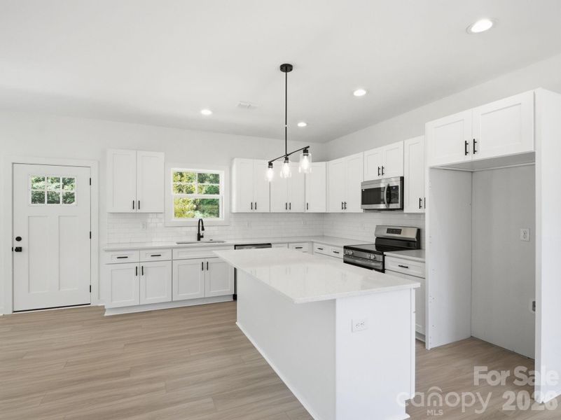 Furnished interior view inside a new home in , Charlotte (Image 3).