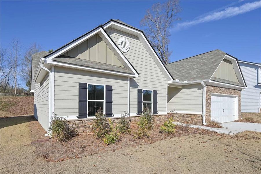 Front exterior of a new home in , Villa Rica, GA, highlighting curb appeal (Image 17).