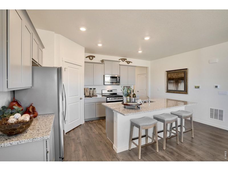 Furnished interior view inside a new home in Fossil Creek Ranch, Windsor (Image 5).