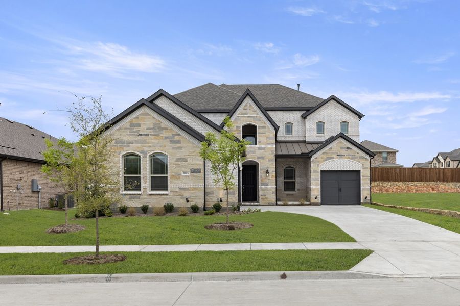 Front exterior of a new home in Brookshire at Legacy Hills, Celina, TX, highlighting curb appeal (Image 1). Front exterior of a new home in Brookshire at Legacy Hills, Celina, TX, highlighting curb appeal (Image 1).