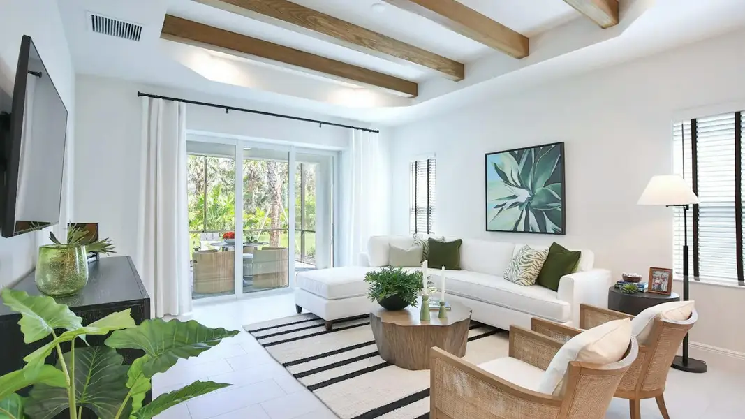 Furnished interior view inside a new home in Boca Royale Golf & Country Club Real Estate and Homes for Sale in Englewood, FL - Neal Communities, Englewood (Image 12). Furnished interior view inside a new home in Boca Royale Golf & Country Club Real Estate and Homes for Sale in Englewood, FL - Neal Communities, Englewood (Image 12).