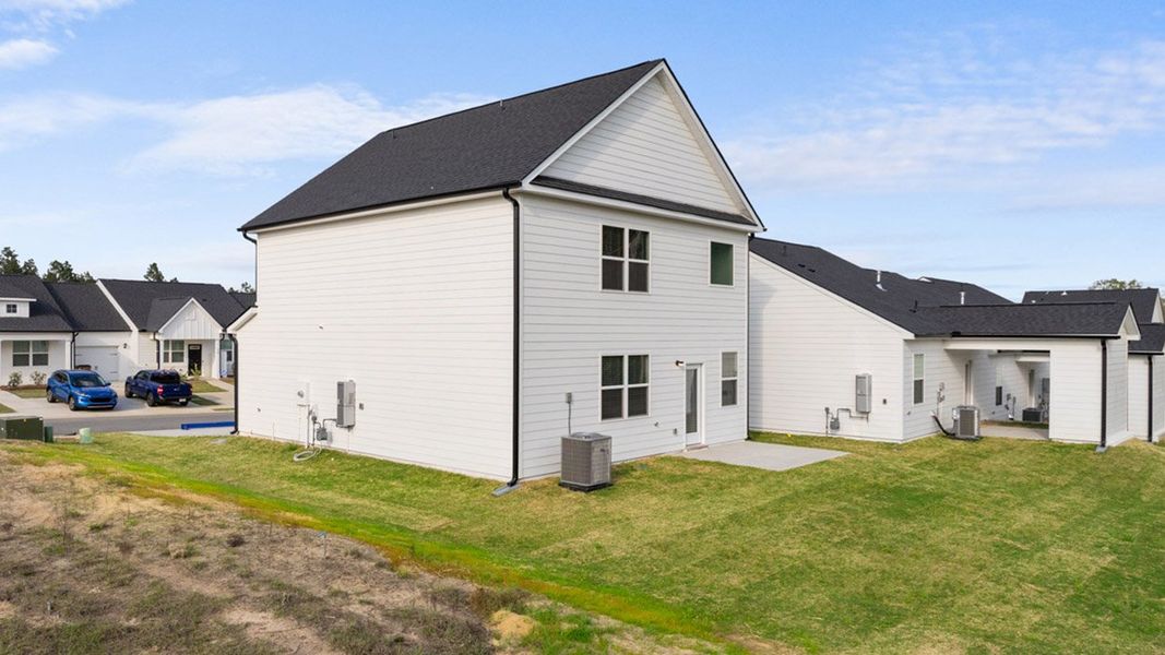 Exterior details and patio area of a home in The Islands, Beech Island (Image 4).