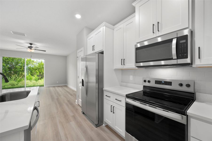 Furnished interior view inside a new home in Celebration Pointe, Fort Pierce (Image 8). Furnished interior view inside a new home in Celebration Pointe, Fort Pierce (Image 8).