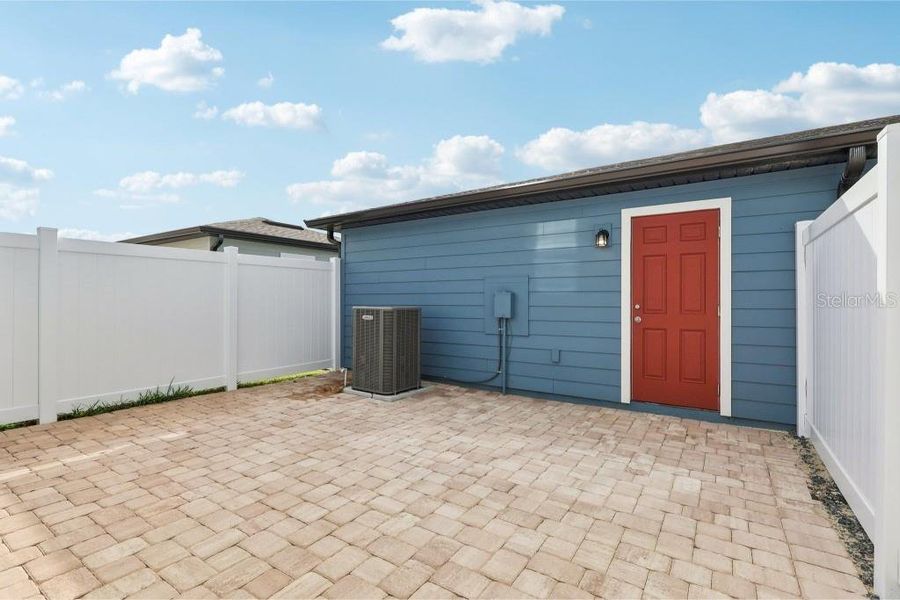 Exterior details and patio area of a home in Northlake Townhomes, Winter Garden (Image 22). Exterior details and patio area of a home in Northlake Townhomes, Winter Garden (Image 22).
