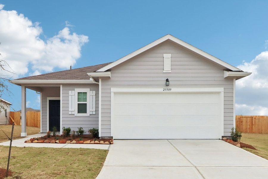 Representative exterior photo of a completed home built from the Glimmer by Starlight Homes in Royal Pines, Porter, TX (Image 1). Representative exterior photo of a completed home built from the Glimmer by Starlight Homes in Royal Pines, Porter, TX (Image 1).