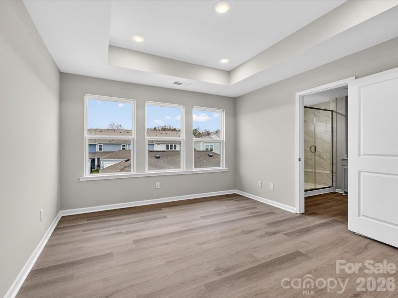 Spacious, unfurnished interior of a new home in North Creek Village, Huntersville (Image 24).