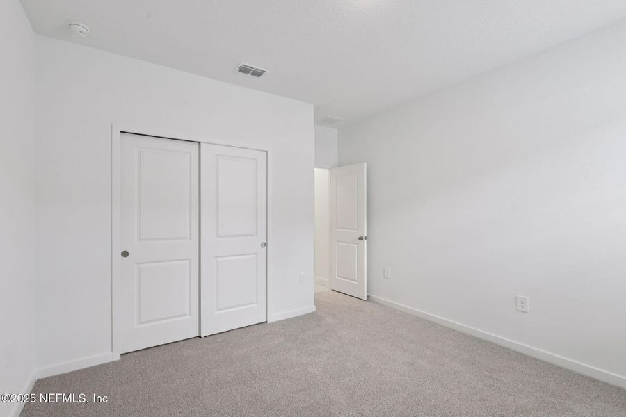 Spacious, unfurnished interior of a new home in Cypress Meadows - Signature Series, Jacksonville (Image 15).