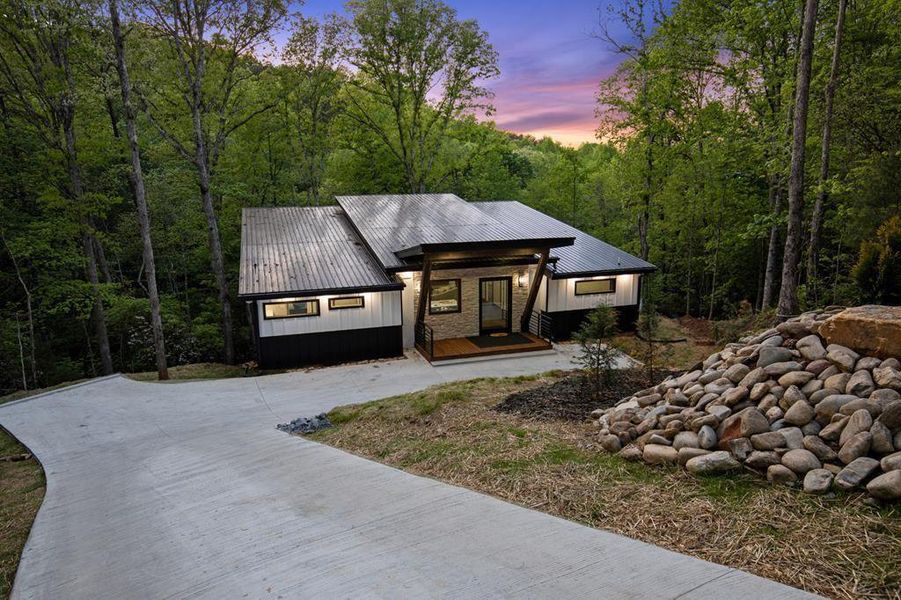 Front exterior of a new home in , Blue Ridge, GA, highlighting curb appeal (Image 1). Front exterior of a new home in , Blue Ridge, GA, highlighting curb appeal (Image 1).