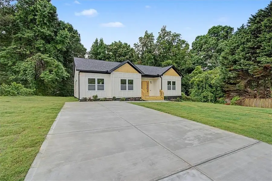 Front exterior of a new home in , Forest Park, GA, highlighting curb appeal (Image 22). Front exterior of a new home in , Forest Park, GA, highlighting curb appeal (Image 22).