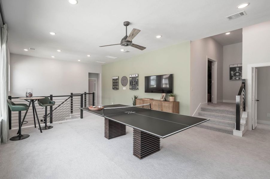 Furnished interior view inside a new home in Bridgeland, Cypress (Image 7).