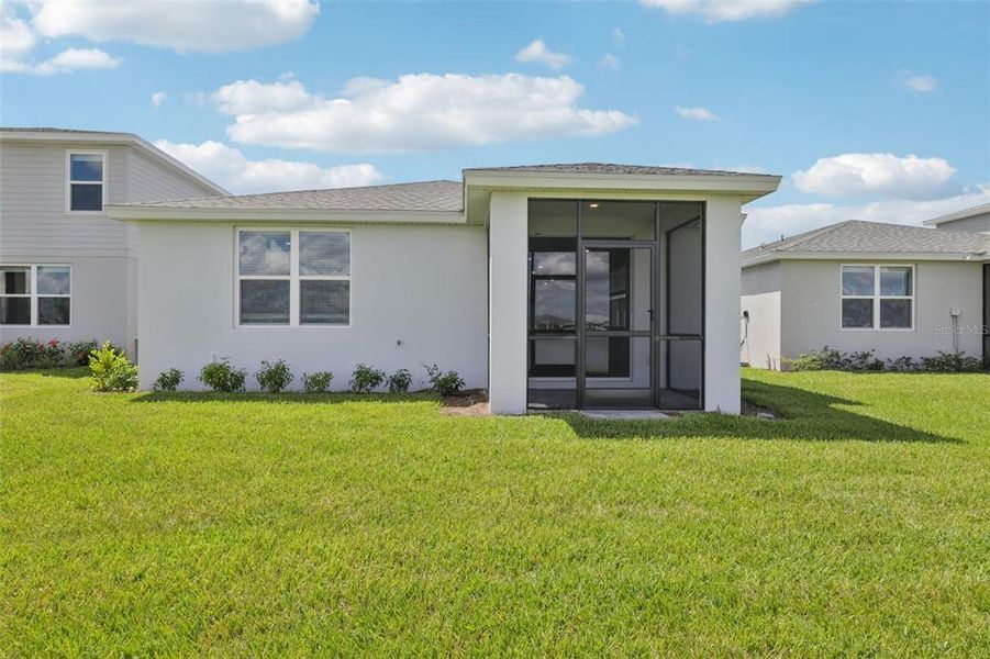 Exterior details and patio area of a home in Crescent Lakes - Premier Series, Punta Gorda (Image 19).