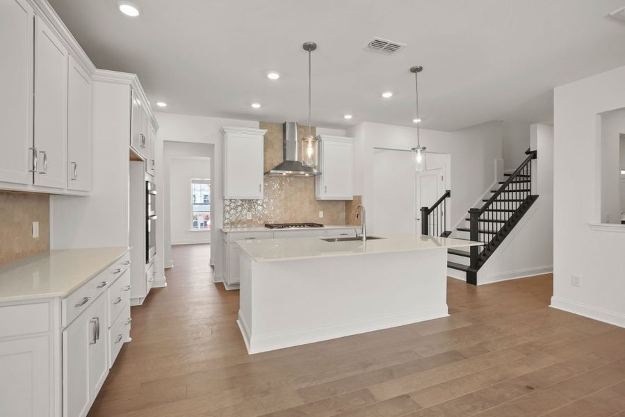 Spacious Kitchen with an Island Spacious Kitchen with an Island