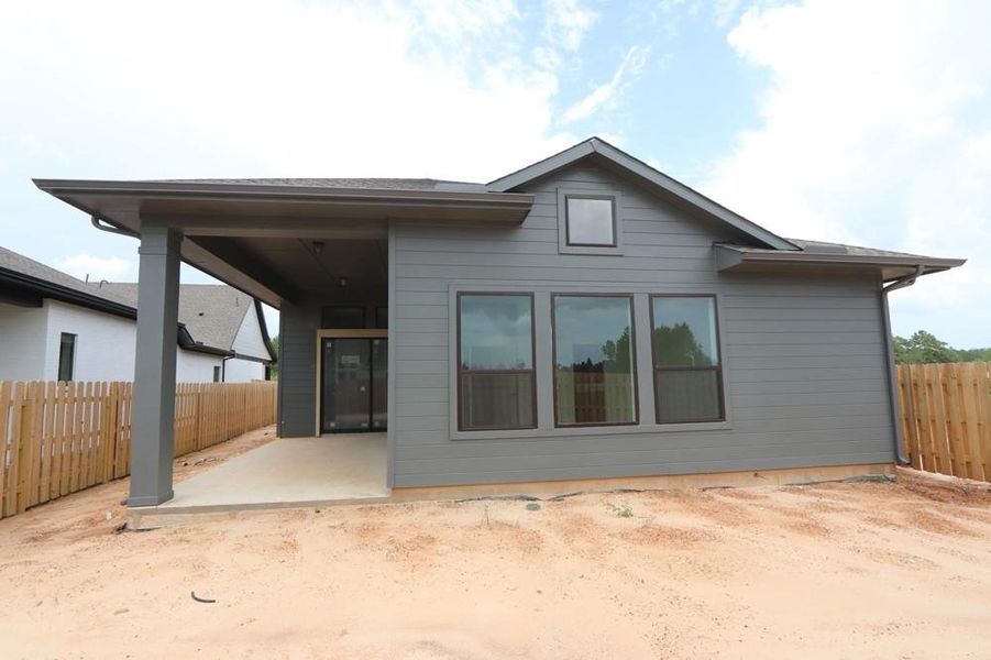 Front exterior of a new home in Colton 45' Homesites, Todd Mission, TX, highlighting curb appeal (Image 1). Front exterior of a new home in Colton 45' Homesites, Todd Mission, TX, highlighting curb appeal (Image 1).