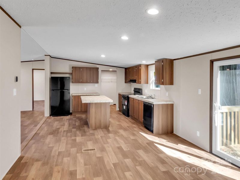 Furnished interior view inside a new home in , Waynesville (Image 5).