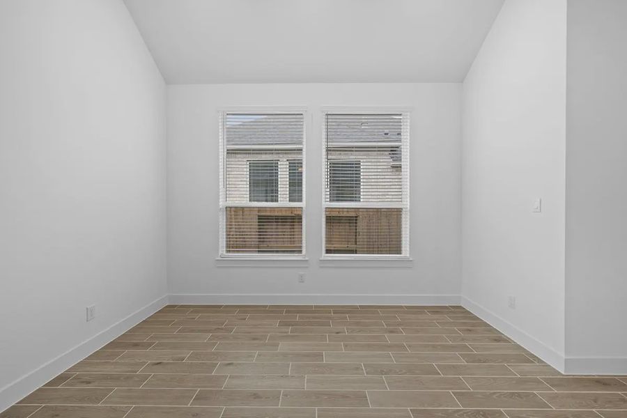 Representative unfurnished interior of a home built from the Summerton by Chesmar Homes in University Heights, Round Rock (Image 24).