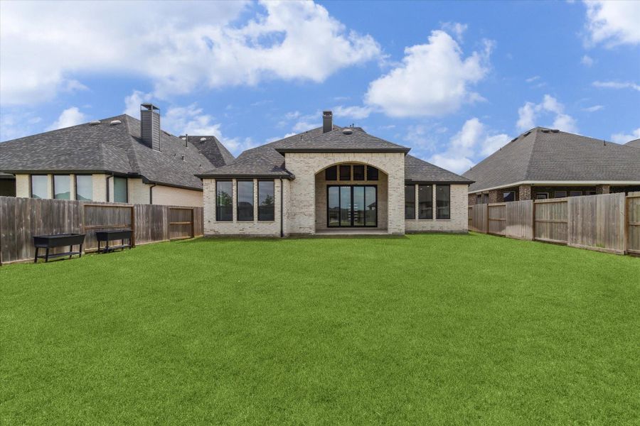 Large backyard could easily be big enough for a pool. The two story covered patio gives extra shade and there is plenty of room for the kids to play and for pets. Large backyard could easily be big enough for a pool. The two story covered patio gives extra shade and there is plenty of room for the kids to play and for pets.